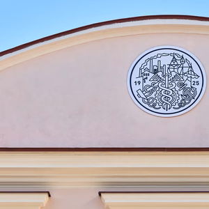 Estonian Chamber of Commerce and Industry emblem on a building facade